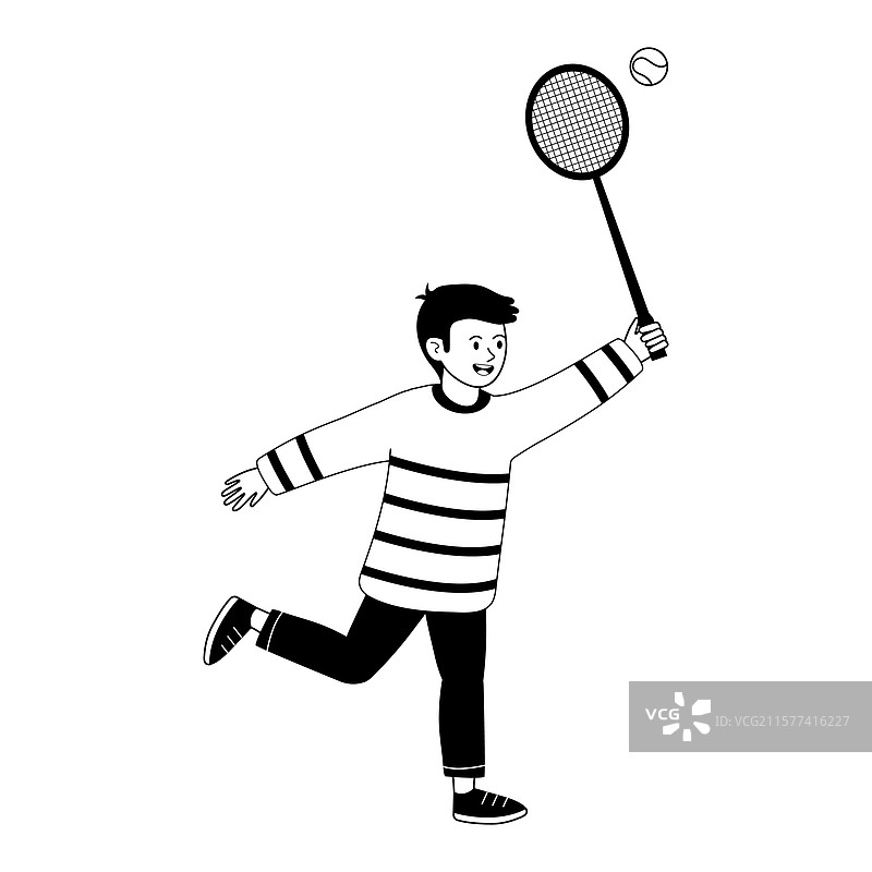 男孩在动态中用球拍打网球图片素材