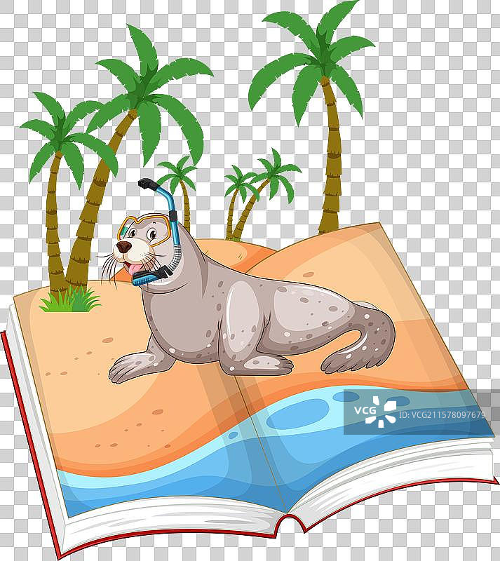 在沙滩上，带着潜水镜的海豹趴在打开的书上图片素材