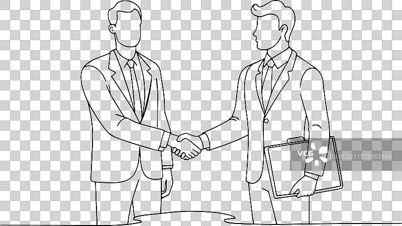 两位商务专业人士在一张桌子上握手图片素材