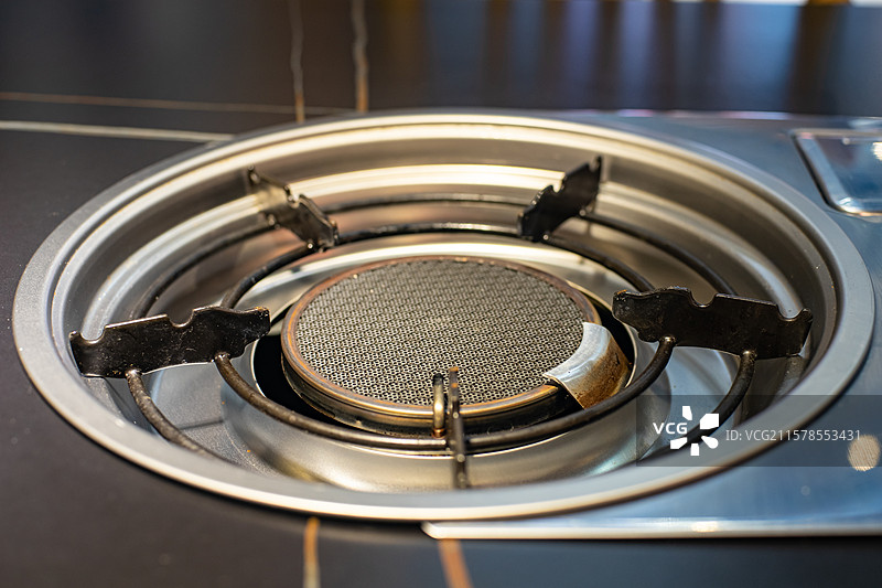 中国房地产城市健康生活拍摄主题，住宅内部环境，厨房内部环境和炉灶灶台上网状结构，室内无人图像摄影图片素材