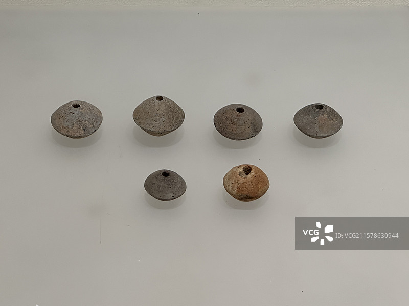 陶纺轮，西汉南越国时期，广州博物馆展览的文物图片素材