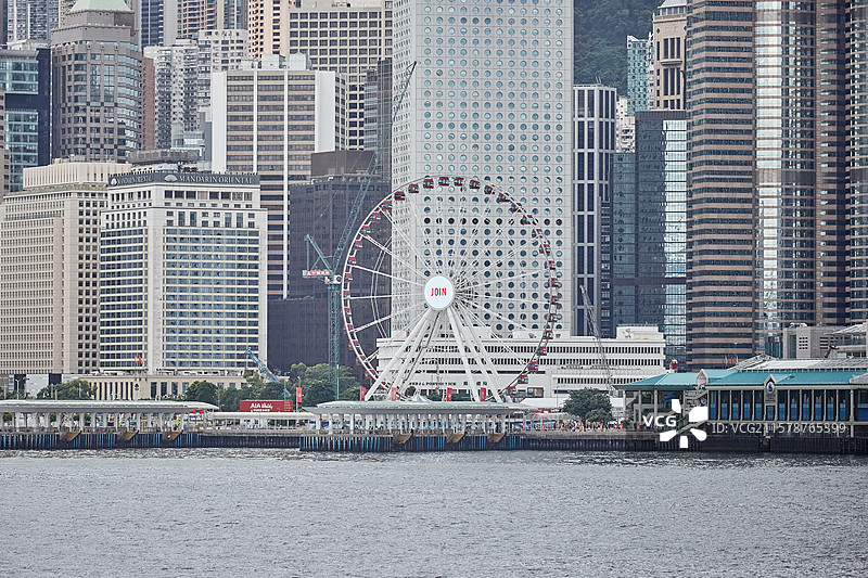 中国香港维多利亚港风光香港中环摩天轮现代城市建筑游乐场图片素材