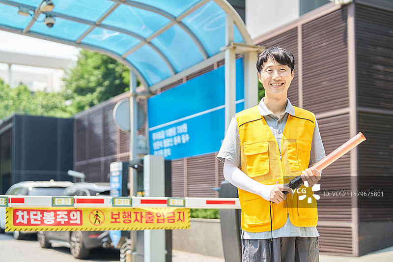 户外，炎热，停车场，停车标志，停车管理员图片素材