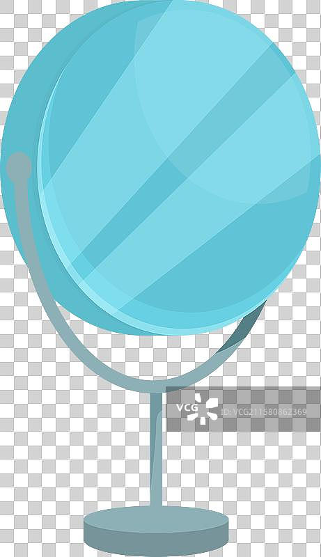 圆形桌面镜子立在桌子上，反射出景象图片素材