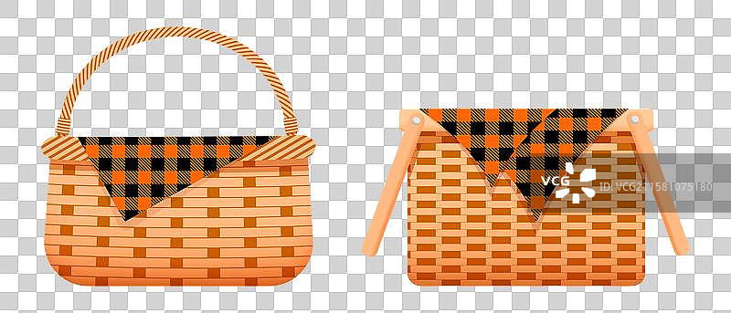 空的柳条野餐篮，配有棉或亚麻布图片素材