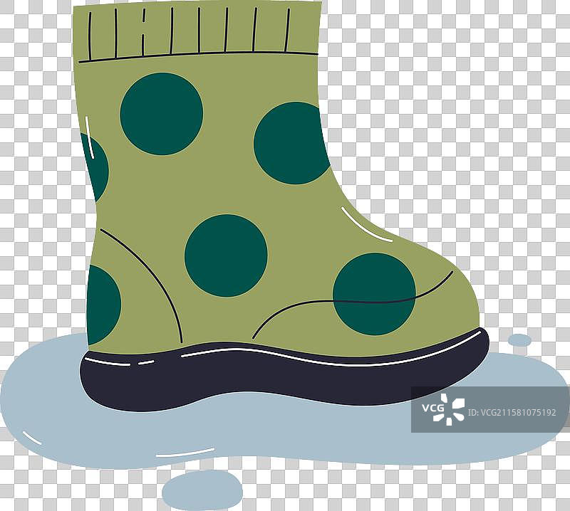 橡胶雨靴在水坑中图片素材