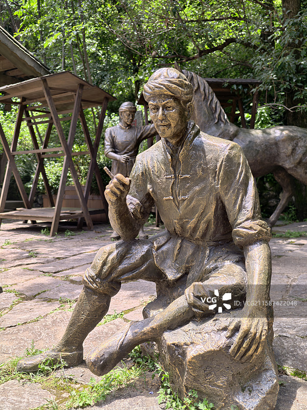 大理凤阳邑茶马古道上的马帮雕像图片素材