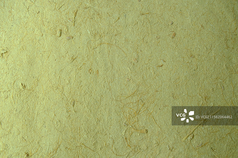 老式黄色纯手工草纸特写。高清纸张背景素材背景图图片素材