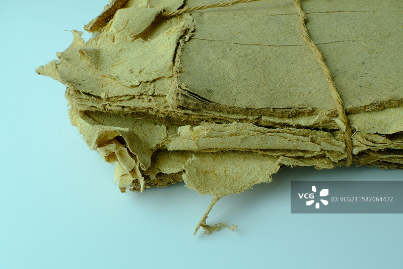 老式黄色纯手工草纸特写。高清纸张背景素材背景图图片素材