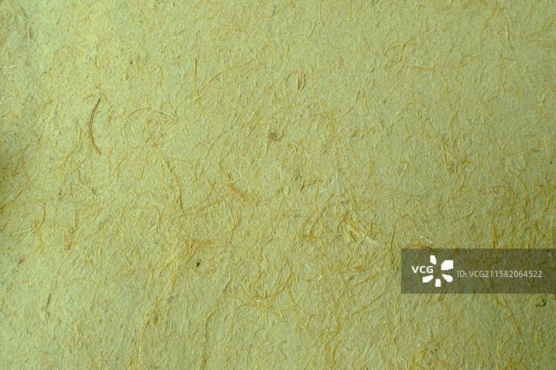 老式黄色纯手工草纸特写。高清纸张背景素材背景图图片素材
