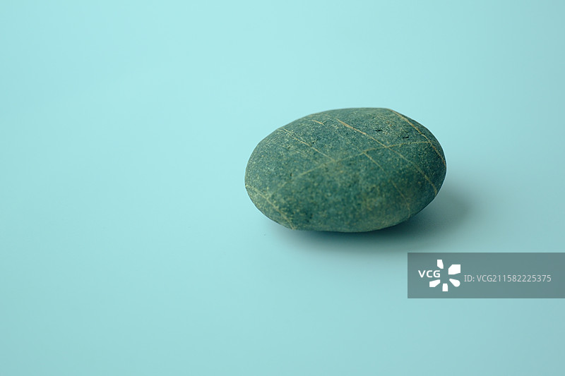 一块石头。鹅卵石。留白设计素材图片素材