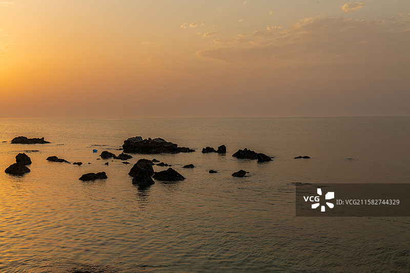 山东烟台牟平养马岛獐岛日出图片素材