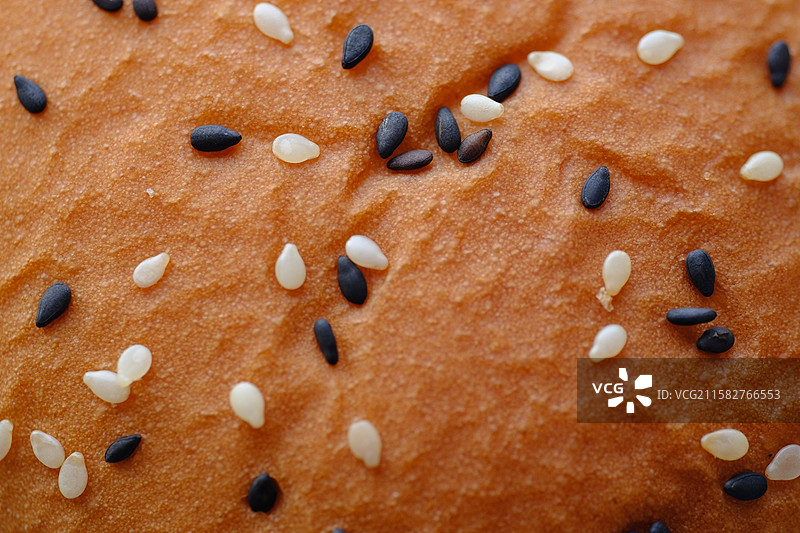 汉堡上的黑白芝麻粒。微距留白设计素材元素图片素材