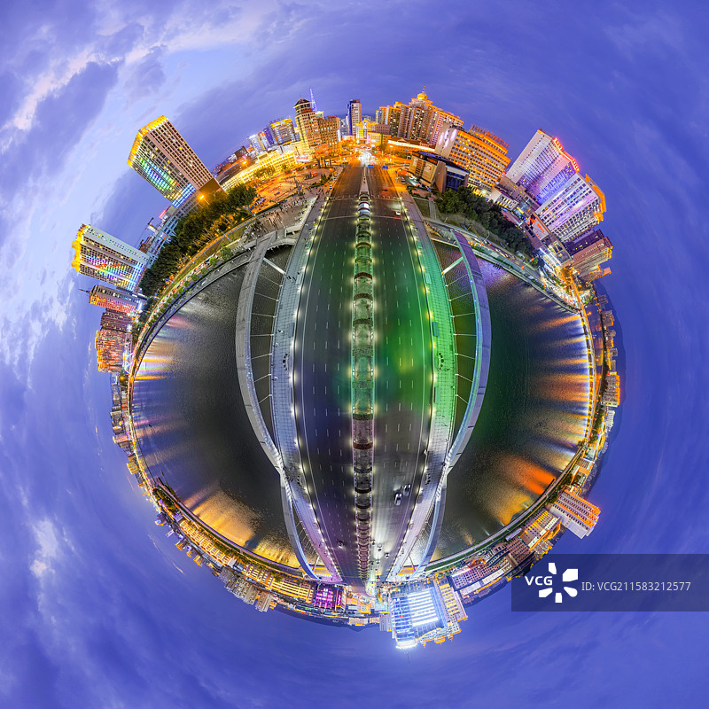 夏季夜晚，无人机航拍吉林省延边朝鲜族自治州延吉市布尔哈通河夜景及河北区域城市亮化。图片素材