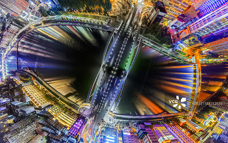 夏季夜晚，无人机航拍吉林省延边朝鲜族自治州延吉市布尔哈通河夜景及河北区域城市亮化。图片素材