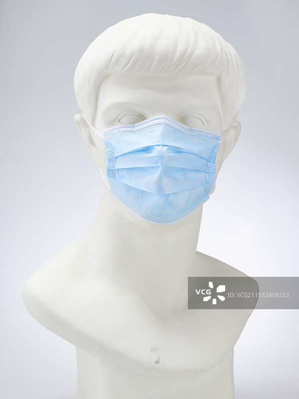 戴口罩的罗马青年石膏像图片素材