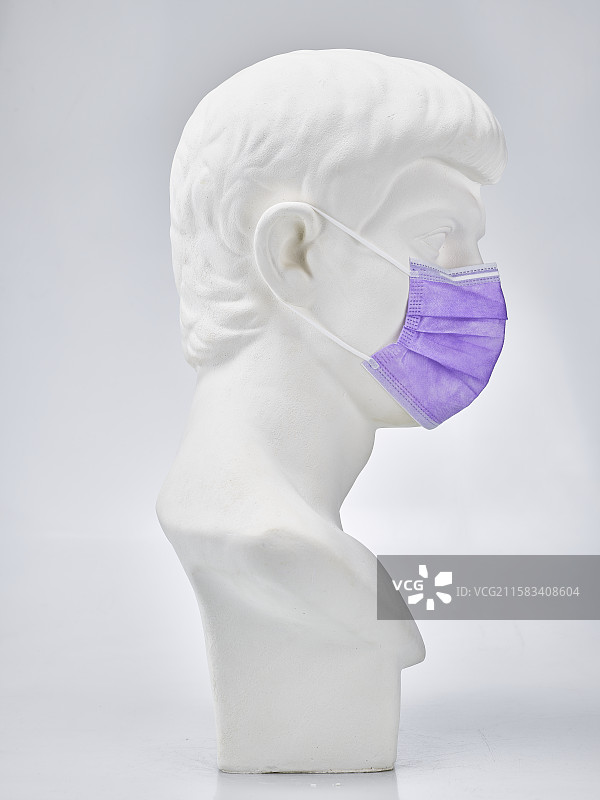 戴口罩的罗马青年石膏像图片素材