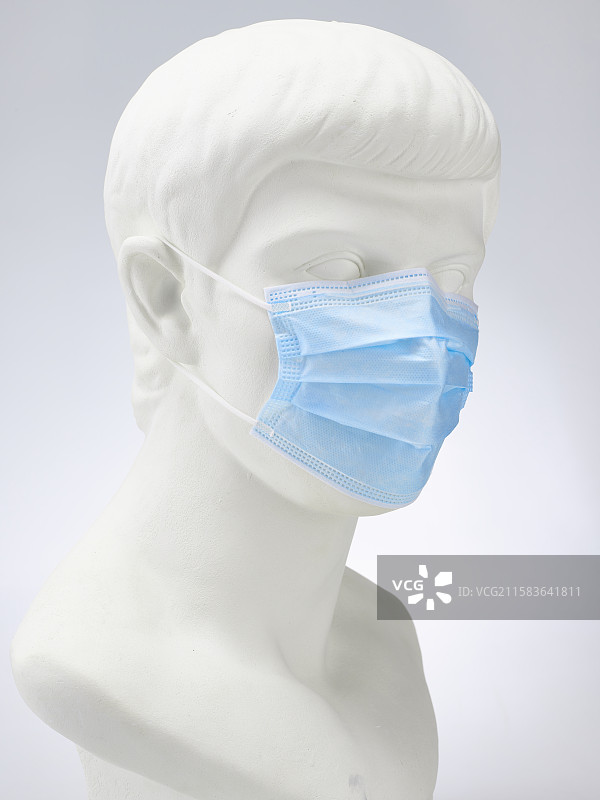 戴口罩的罗马青年石膏像图片素材