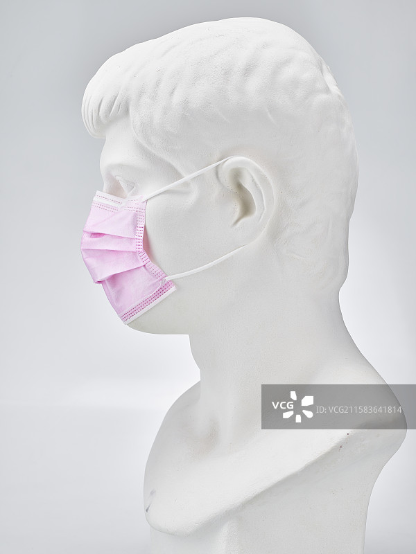 戴口罩的罗马青年石膏像图片素材