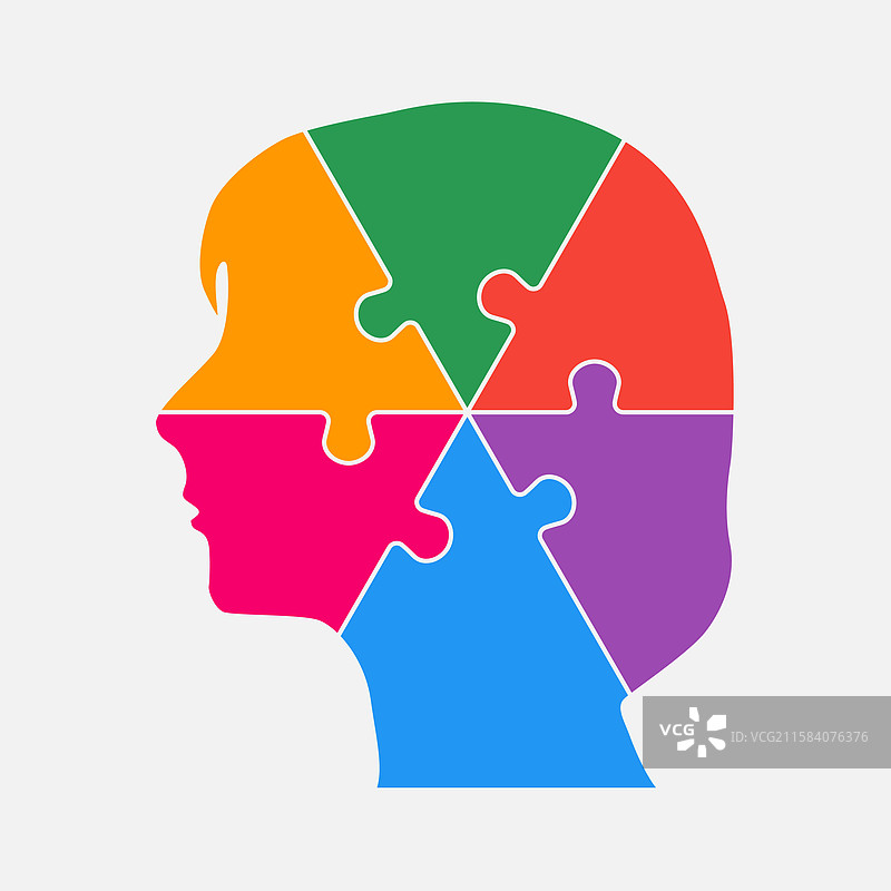 女性头部由拼图块组成的人脑图片素材