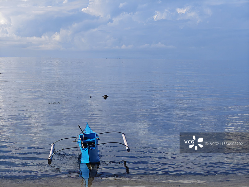 海岛海洋海边渔船小船天空日落图片素材