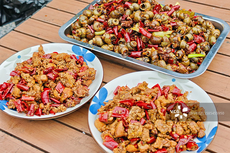 成都美食爆炒田螺冷吃兔图片素材