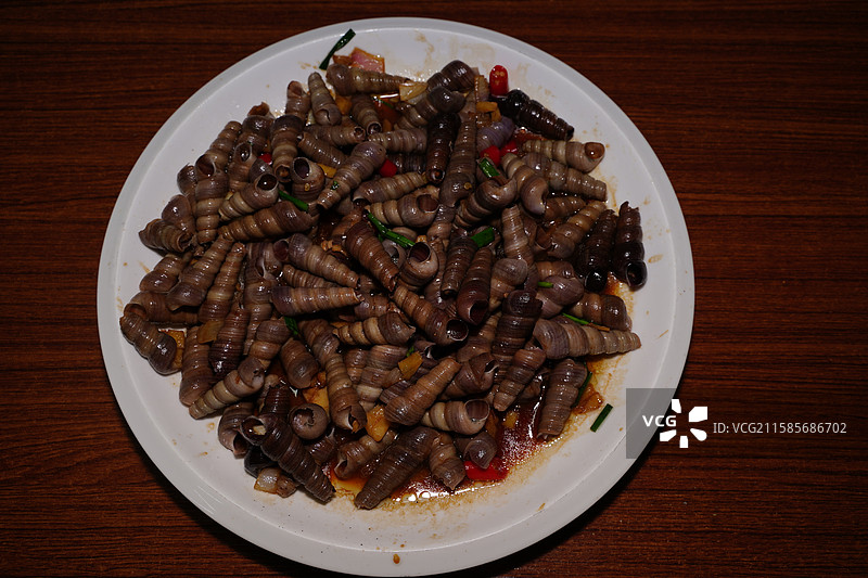 家常炒钉螺图片素材