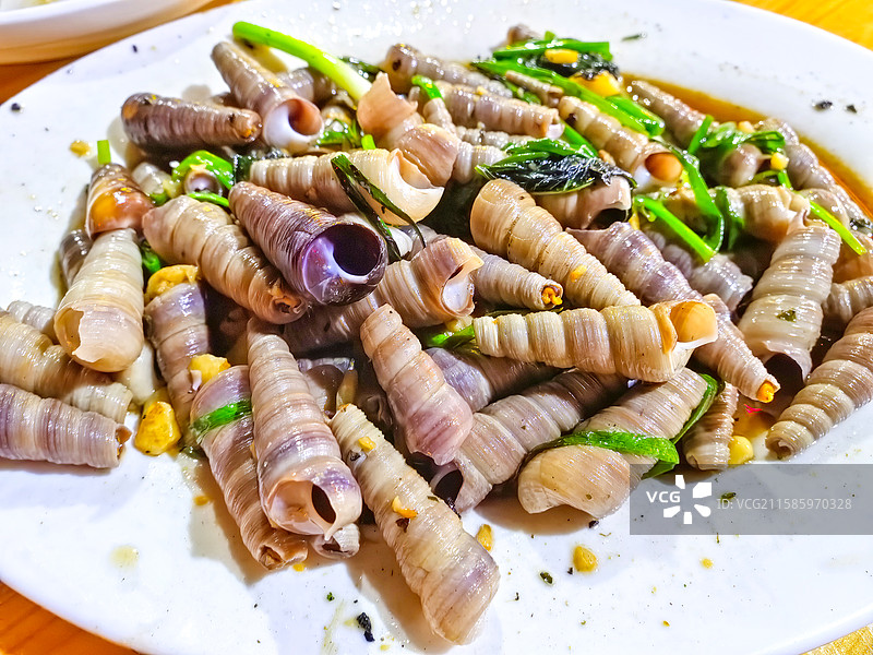 爆炒钉螺海鲜美食特写图片素材