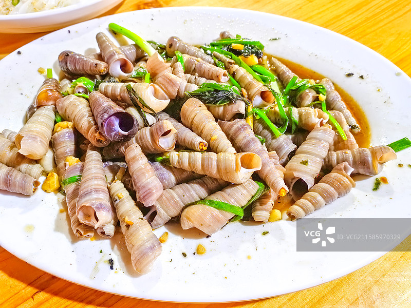 爆炒钉螺海鲜美食特写图片素材