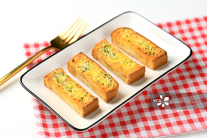 黄油蒜香面包条图片素材