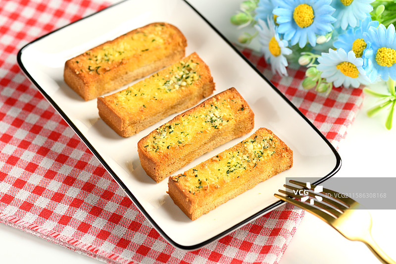 黄油蒜香面包条图片素材