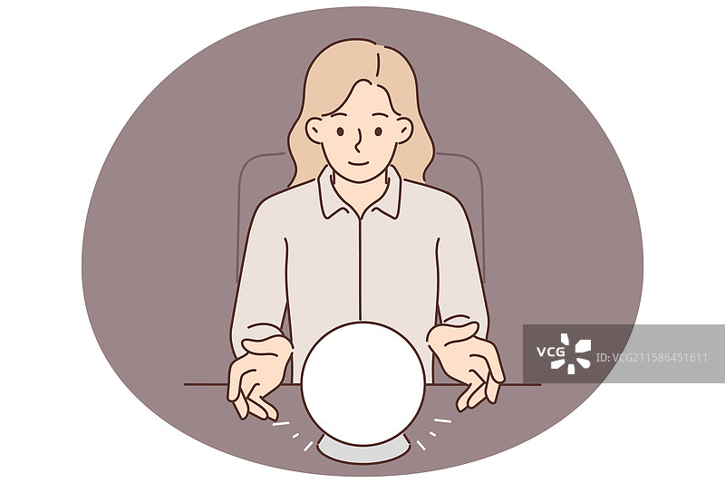 女人使用水晶球预测未来图片素材