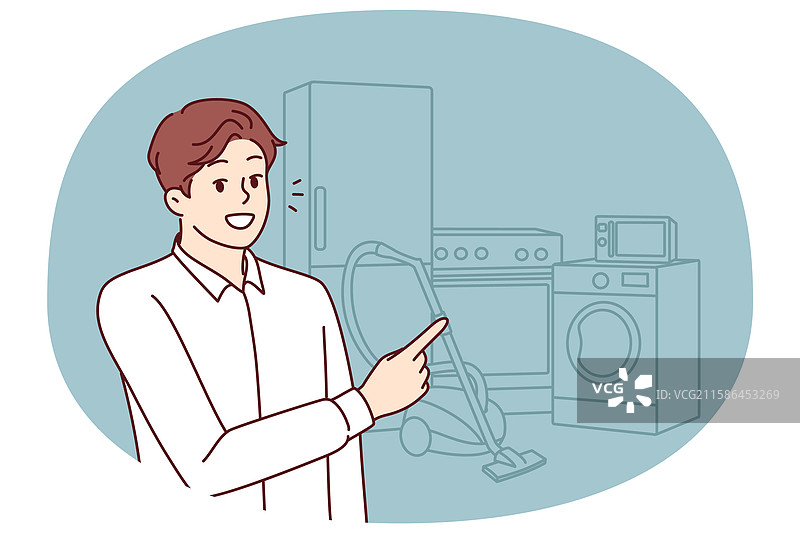 男售货员用手指指着洗衣机图片素材