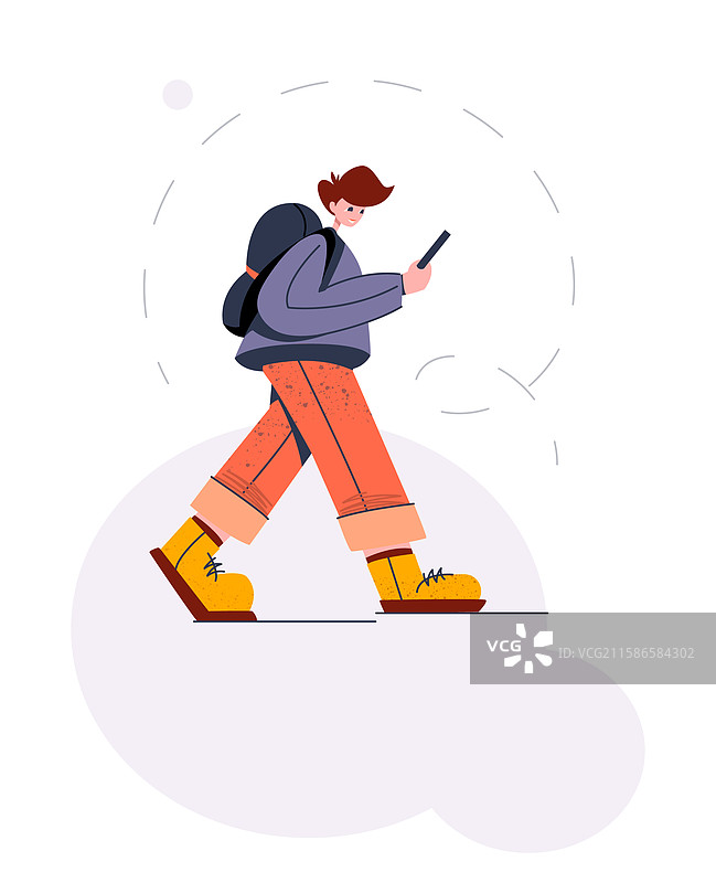 年轻男子走路时使用手机图片素材