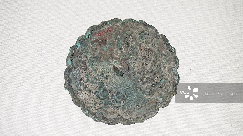 宋达摩渡海纹葵形铜镜，福建博物院藏图片素材