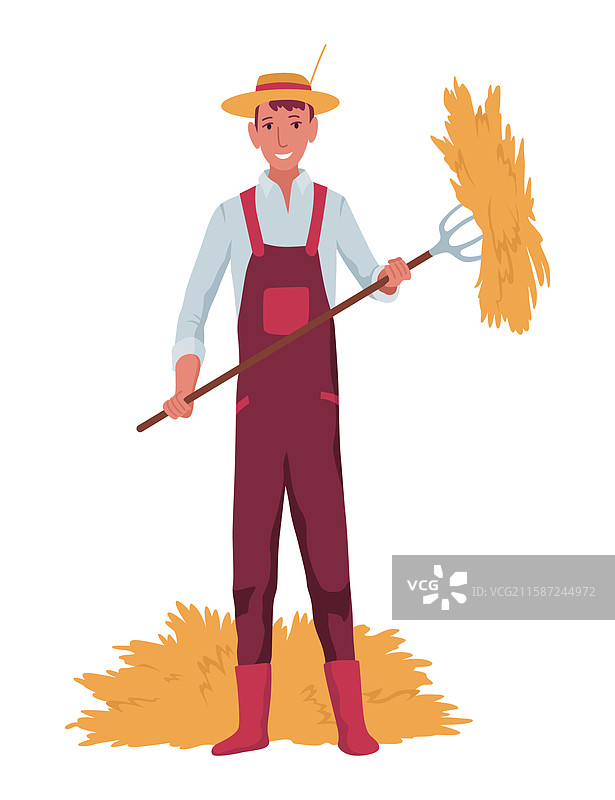 一位专注的农村农民手持干草叉和稻草图片素材