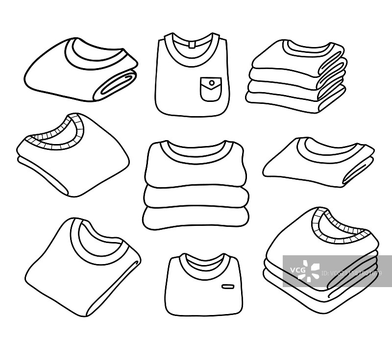 卷起的T恤和叠好的毛衣套装图片素材