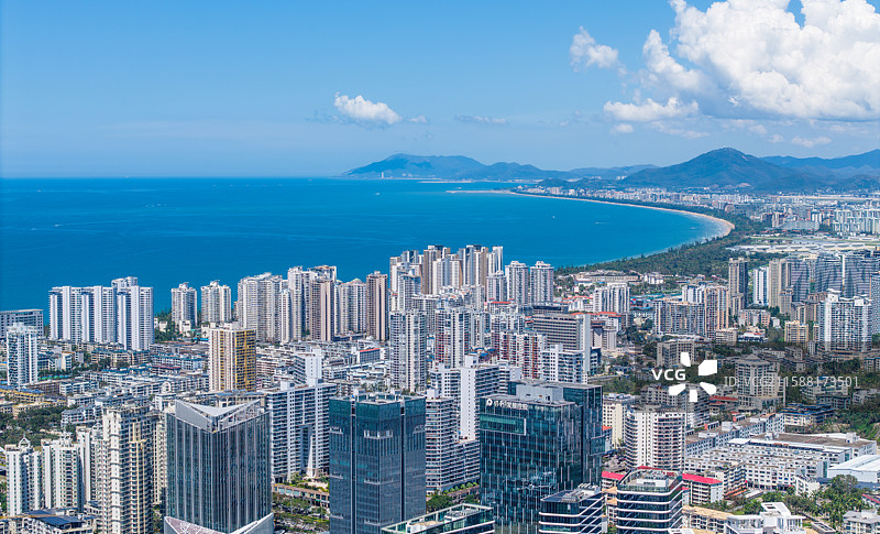 海南三亚海岸线CBD建筑中央商务区城市夜景交通高视角航拍图片素材