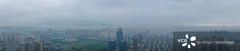 郑州市荥阳市清晨晨雾云海中的市区城区图片素材