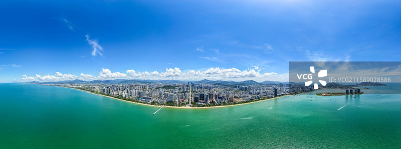 海南三亚海岸线CBD建筑中央商务区城市夜景交通高视角航拍图片素材