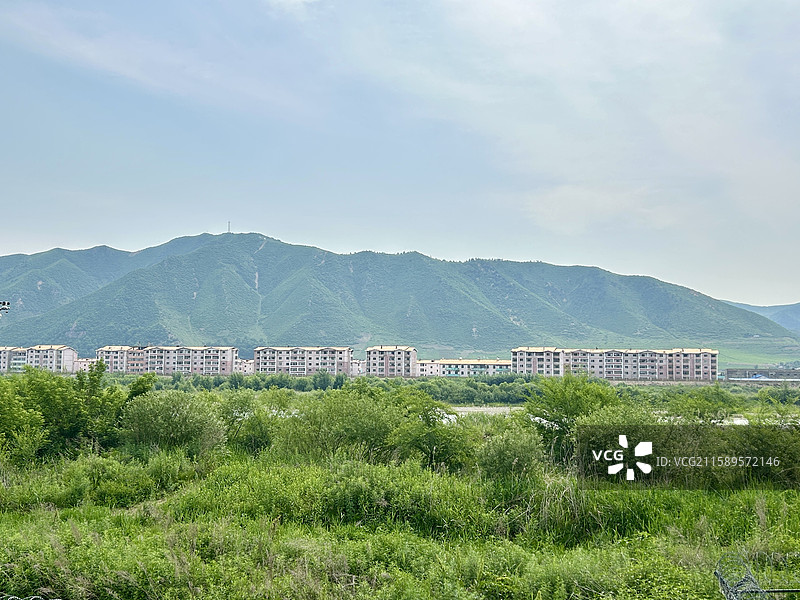吉林省延边州图们市图们口岸图们江对面朝鲜城镇风景图片素材