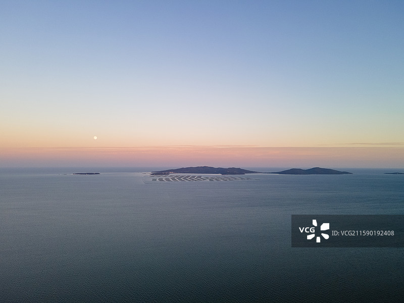 黄昏下的兴城海滨景色图片素材