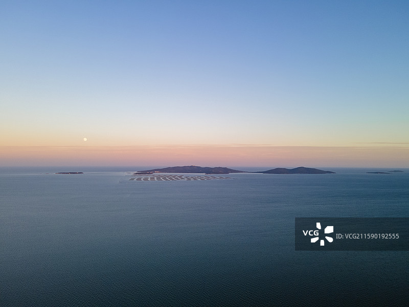 黄昏下的兴城海滨景色图片素材