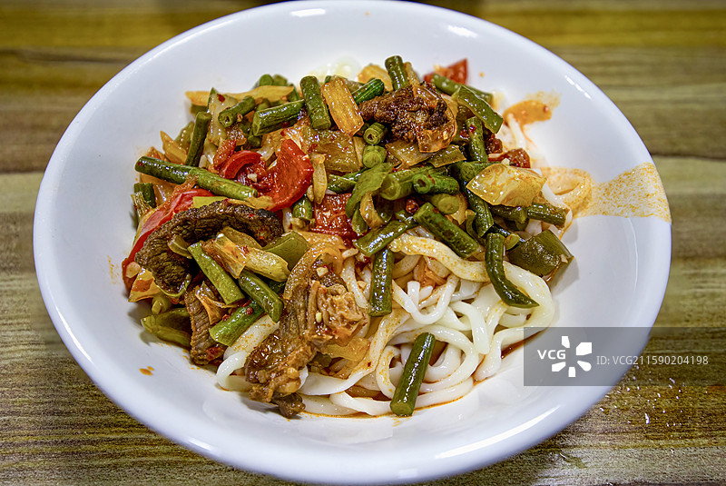 新疆维吾尔族塔什库尔干塔吉克自治县塔合曼乡塔吉克族特色炒面图片素材