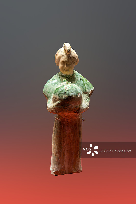 唐三彩女立俑，唐开元十四年，武威市高坝二队出土，国家三级文物，武威市博物馆藏图片素材