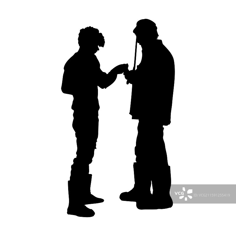 两个人传递接力棒的剪影图片素材