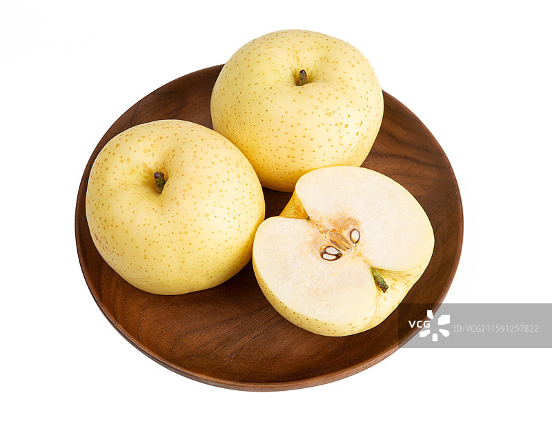 新鲜的黄金梨孤立在白色背景上图片素材
