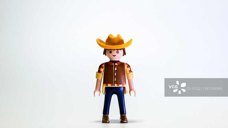 玩具人仔静物摄影特写白底图西部牛仔系列图片素材