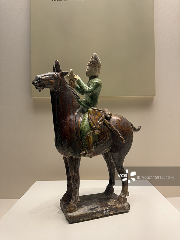 三彩绞釉陶狩猎骑俑，唐，陕西乾县懿德太子墓，中国国家博物馆图片素材