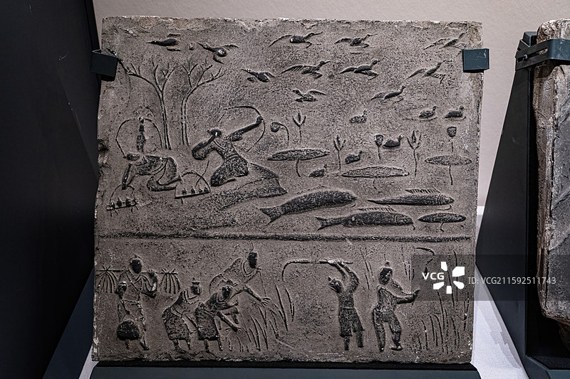 成都文物考古研究院藏东汉弋射收获画像砖图片素材